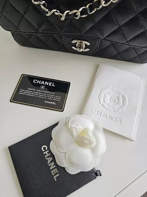 PRE-LOVED CHANEL BLACK CAVIAR MEDIUM CLASSIC DOUBLE FLAP QUILTED SHOULDER BAG