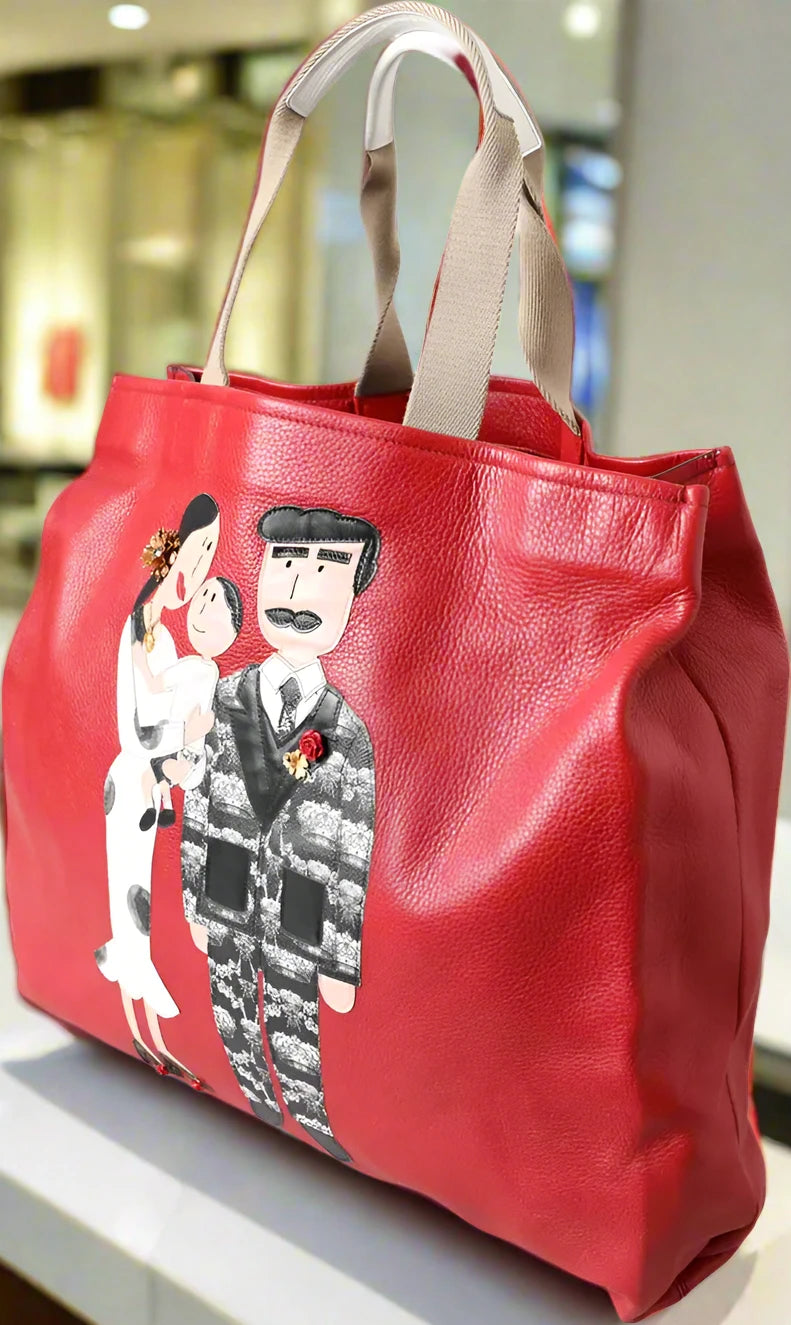 BOLSO DE COMPRAS DE PIEL ROJA CON PARCHE #DGFAMILY DE Dolce &amp; Gabbana